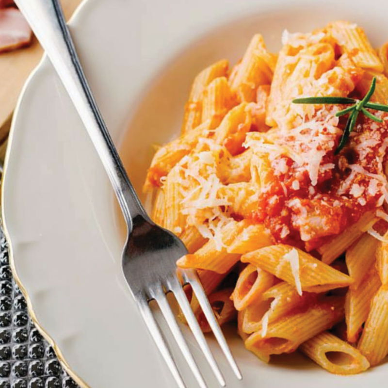 Penne pasta with bacon and tomato.jpg